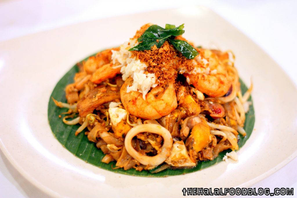 Premium Crab Meat and Salted Egg Fried Kway Teow ($15.95)